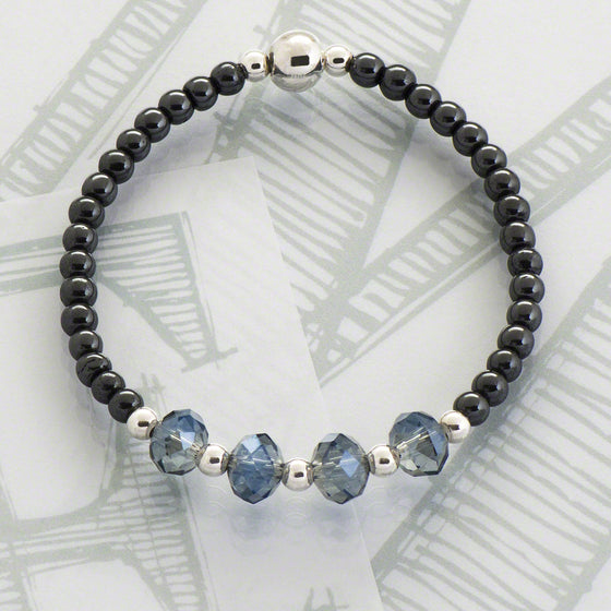 Flora delicate semi-precious hematite/pale blue crystal bracelet by Elli